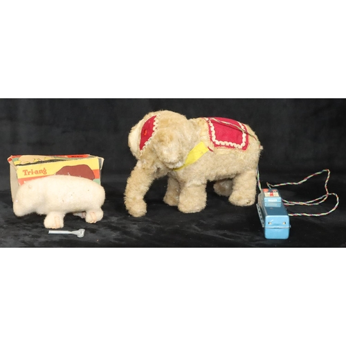 806 - A battery operated mechanical elephant, 16cm high, a Tri-Ang Minic walking bear (boxed) (2)