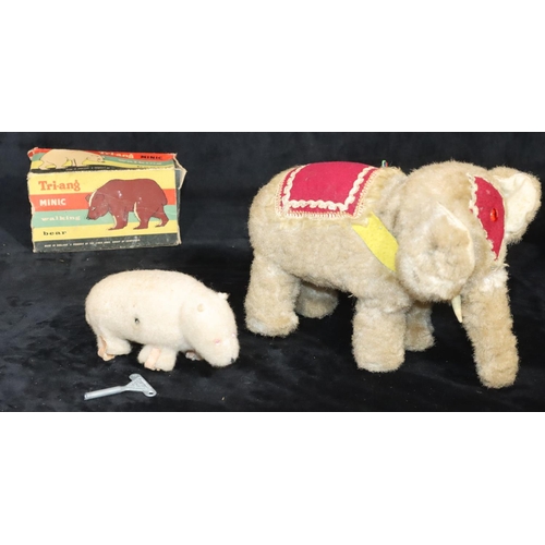 806 - A battery operated mechanical elephant, 16cm high, a Tri-Ang Minic walking bear (boxed) (2)