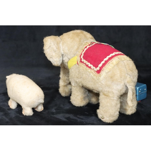 806 - A battery operated mechanical elephant, 16cm high, a Tri-Ang Minic walking bear (boxed) (2)