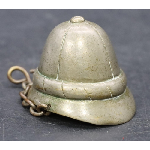 808 - A Novelty compass in the form of a pith helmet with chain, 4cm high