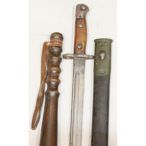 809 - A WWI bayonet with leather and metal sheath, stamped 