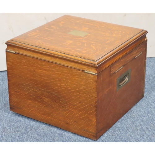 812 - A square oak canteen case with hinged lid enclosing 2 further hinged lids and 1 long drawer below (n... 