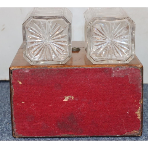 815 - A 19th Century oak rectangular shaped box with hinged lid enclosing 2 square decanters with stoppers... 