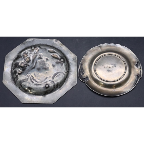 832 - An Art Nouveau pewter octagonal small dish having raised figurehead of a lady, 16cm wide and a simil... 