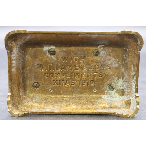 842 - W T Lamb & Sons brass desk calendar on rectangular shaped stand, stamped 