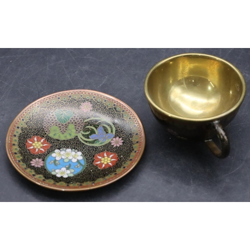 851 - A cloisonné small brass cup and saucer with multi-coloured floral, leaf and scroll decoration