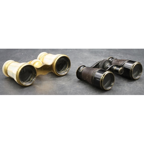 874 - Lemaire, Paris, gilt metal and Mother of Pearl opera glasses and another pair of opera glasses (2)