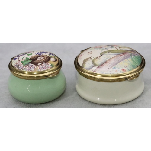 876 - 2 Leslie Creasey enamelled round bulbous shaped pill boxes depicting bird and bird's nest (both boxe... 