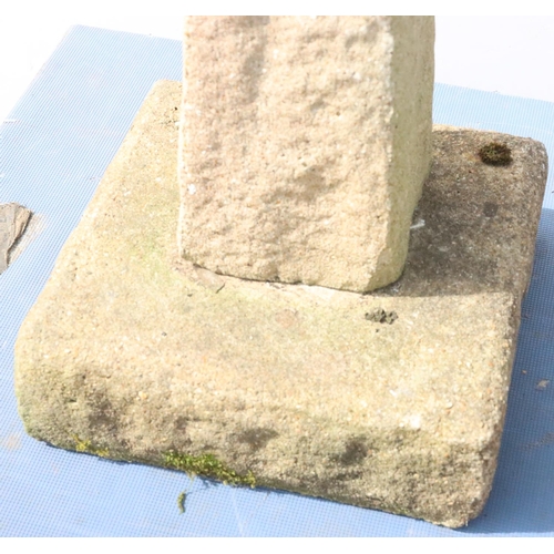 878 - A small concrete hexagonal bird bath on tapering base and square plinth, 62cm high, 31.5cm wide