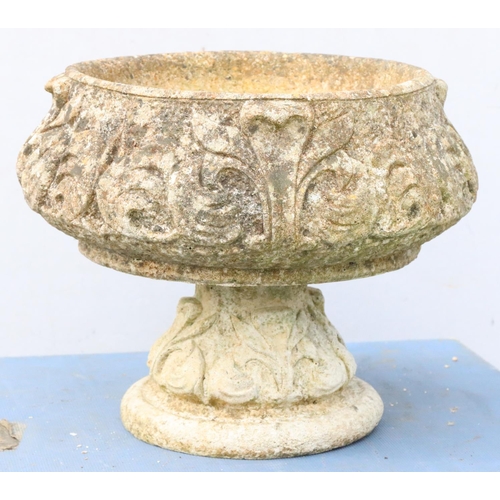 879 - A round bulbous shaped garden jardinière on separate bulbous base with raised leaf and scroll decora... 