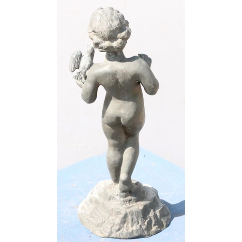 886 - A Bulbeck Foundry lead figure of a young child holding a bird, on round sweeping base, 57cm high, 21... 