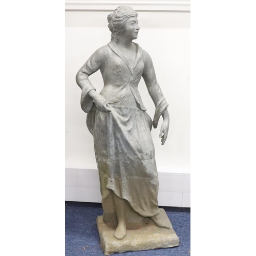 888 - A Bulbeck Foundry large lead figure of a standing lady on rectangular base, 106cm high