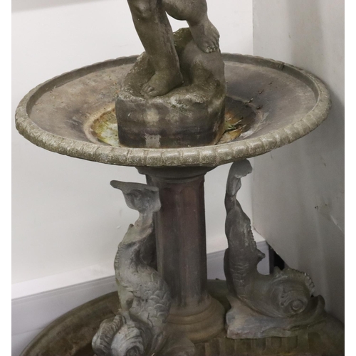 890 - A Bulbeck Foundry large garden fountain with young cupid blowing horn, on circular surround and supp... 