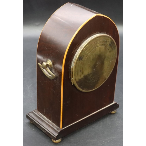 906 - An Edwardian mahogany time piece with inlaid shell motif and stringing, 2 brass carrying handles on ... 