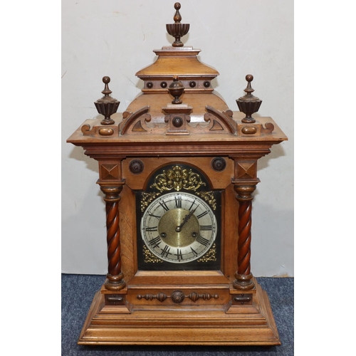 908 - H.A.C walnut 8-day striking mantel clock with turned finials, gilt arched dial with half round twist... 