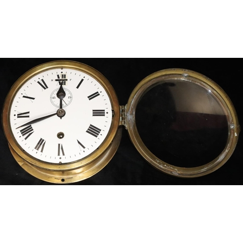 915 - A brass circular hanging wall clock with white enamel dial, seconds dial and Roman numerals, 21cm wi... 