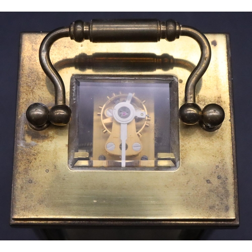 916 - Rapport, London, brass carriage clock with white enamel dial, Roman numerals, swing overhead handle ... 