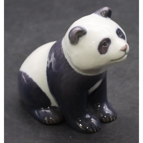 92 - A Royal Copenhagen figure of a seated panda bear, 9cm high