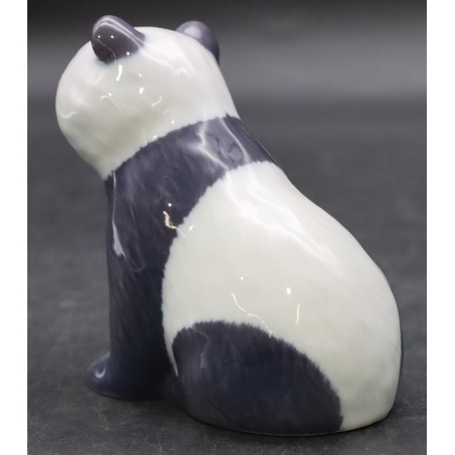 92 - A Royal Copenhagen figure of a seated panda bear, 9cm high