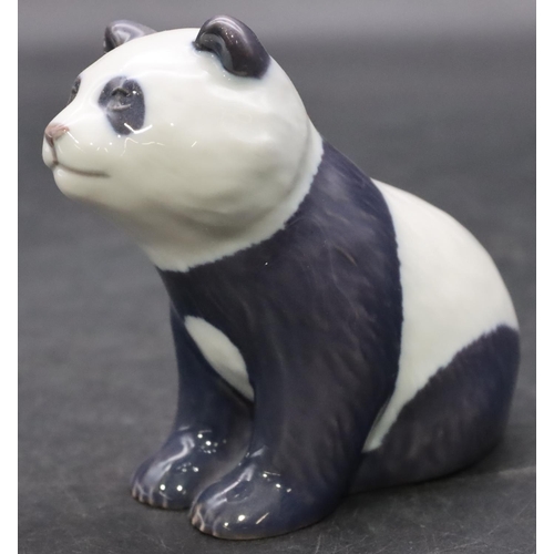 92 - A Royal Copenhagen figure of a seated panda bear, 9cm high