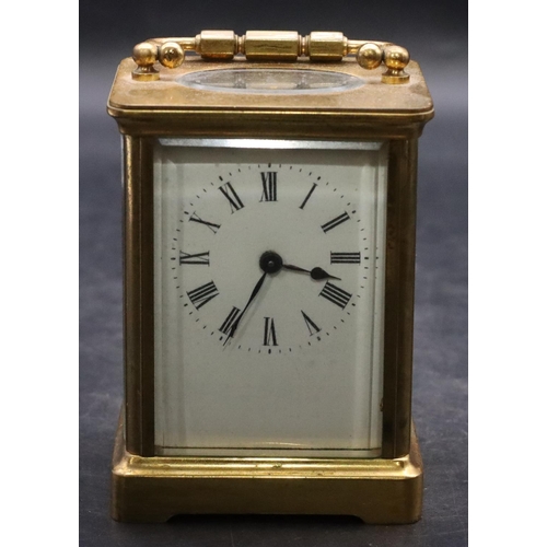 921 - R & Co., Paris, brass carriage clock with white enamel dial and Roman numerals, brass swing overhead... 