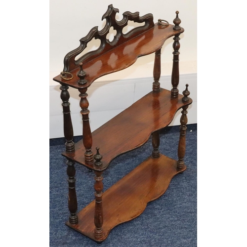 929 - A Victorian walnut 3-tier hanging set of scallop shaped shelves with turned finials, 41cm wide, 55.5... 