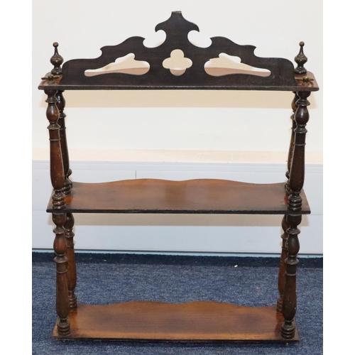 929 - A Victorian walnut 3-tier hanging set of scallop shaped shelves with turned finials, 41cm wide, 55.5... 