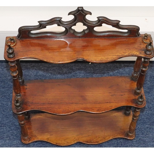 929 - A Victorian walnut 3-tier hanging set of scallop shaped shelves with turned finials, 41cm wide, 55.5... 