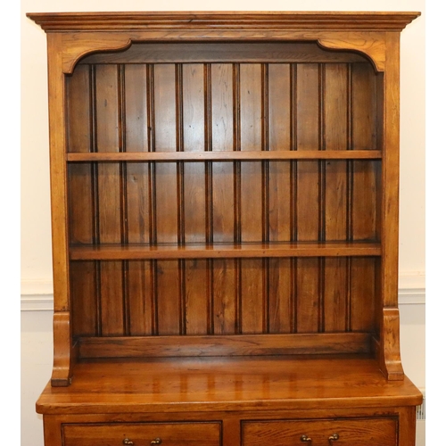 930 - A good quality Willis & Gambier vintage oak dresser with shelved back, 2 drawers with 2 panel doors ... 