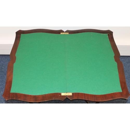 931 - A mahogany small rectangular scallop shaped swivel topped card table with green baize interior, on 4... 