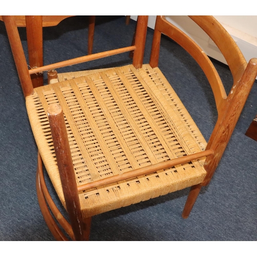 935 - A Danish teak dining room suite, comprising of a set of 6 single chairs with natural paper cord wove... 