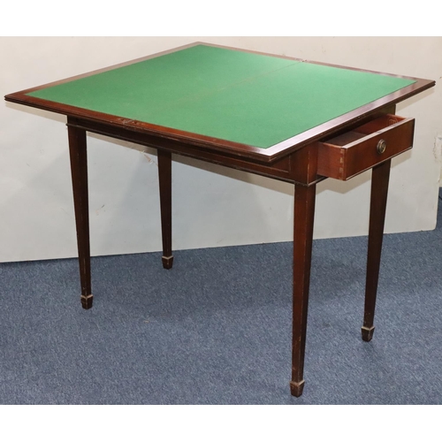 936 - A reproduction mahogany swivel top card table with banded rim, 2 end drawers on square tapering legs... 