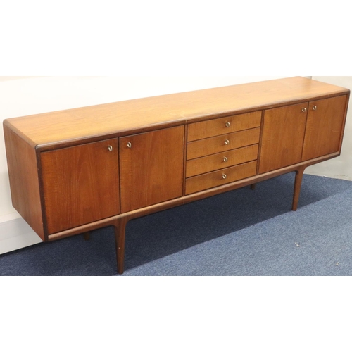 937 - A Younger retro teak large sideboard with 4 centre drawers flanked by 4 panelled doors, 214cm long, ... 