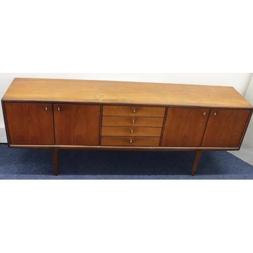 937 - A Younger retro teak large sideboard with 4 centre drawers flanked by 4 panelled doors, 214cm long, ... 