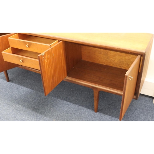 937 - A Younger retro teak large sideboard with 4 centre drawers flanked by 4 panelled doors, 214cm long, ... 