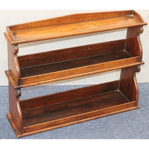 941 - A 19th Century mahogany tabletop 3-tiered graduated book trough, 77cm wide, 20.5cm deep, 58cm high