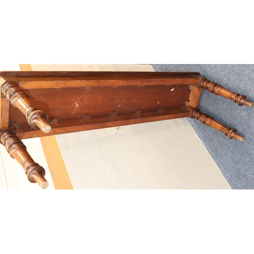 943 - A 19th Century mahogany duet hall stool with carved scroll handles on turned legs, 122cm long, 30cm ... 