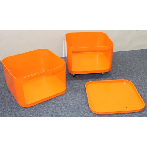 945 - A vintage Anna Castelli, Kartell, orange Componibili, in 2 sections with square removable top, on ca... 