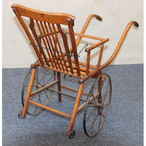 950 - A child's French girl's pram/chair, 86cm long overall