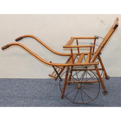 950 - A child's French girl's pram/chair, 86cm long overall