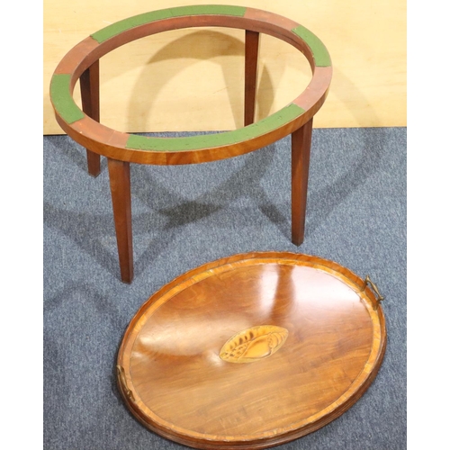 956 - A 19th Century mahogany oval 2-handled tray and stand with inlaid centre shell motif, banded rim and... 