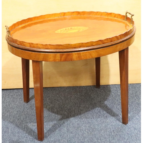 956 - A 19th Century mahogany oval 2-handled tray and stand with inlaid centre shell motif, banded rim and... 