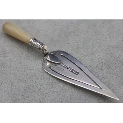 357 - A Birmingham silver bookmark in the form of a trowel with Mother of Pearl handle