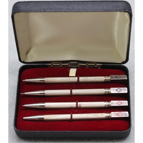 358 - A set of 4 sterling silver Bridge propelling pencils with engine turned decoration (Cased)