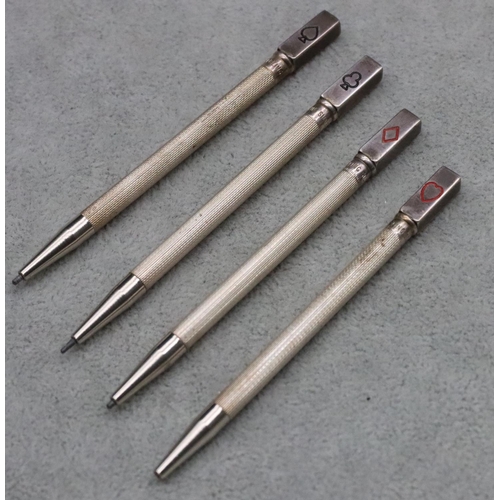 358 - A set of 4 sterling silver Bridge propelling pencils with engine turned decoration (Cased)