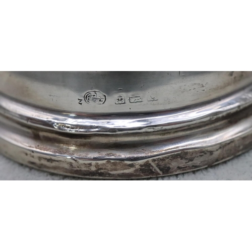 368 - A Birmingham silver round bulbous shaped inkwell with hinged lid (lid dented) on weighted base, 8.7c... 