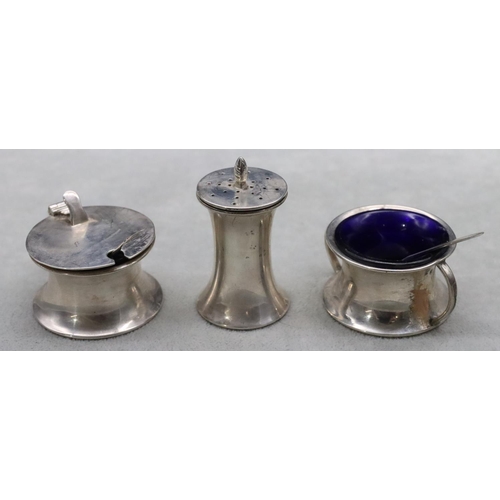 369 - A Birmingham silver 3-piece condiment set, comprising of mustard with hinged lid and blue glass line... 