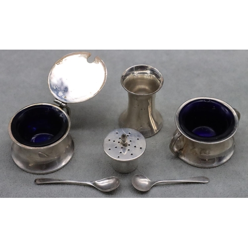 369 - A Birmingham silver 3-piece condiment set, comprising of mustard with hinged lid and blue glass line... 