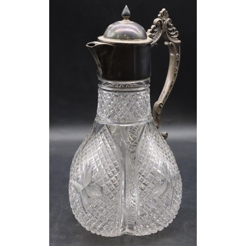 377 - A heavy cut glass round bulbous claret jug with Sheffield silver neck, hinged lid and scroll handle,... 