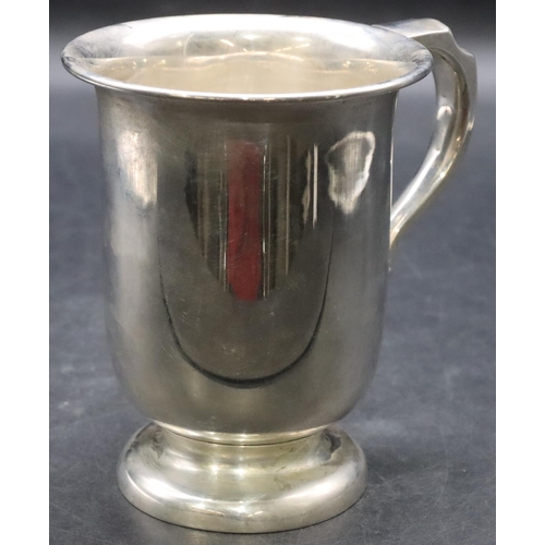 382 - A Birmingham plain silver trumpet shaped tankard with scroll handle on sweeping foot, 13cm high, 8.3... 